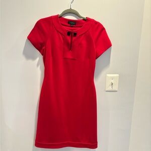 Women’s red Tahari dress with keyhole closure on front